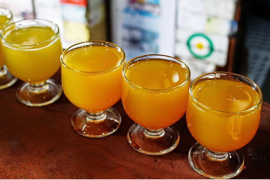 Traditional poncha being prepared at Poncha do Calvário in Madeira
